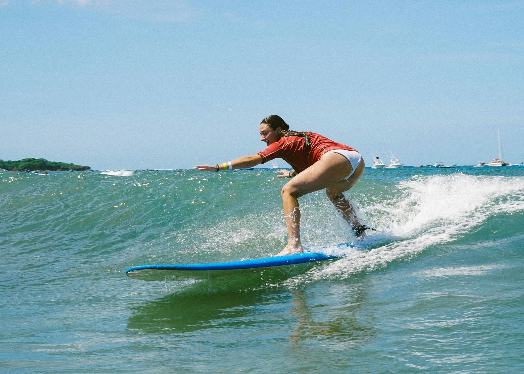 Tamarindo Beach surfer a solo female traveller surfs on Tamarindo Beach